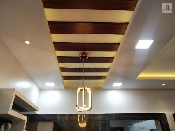 Wooden slat false ceiling with a pendant light