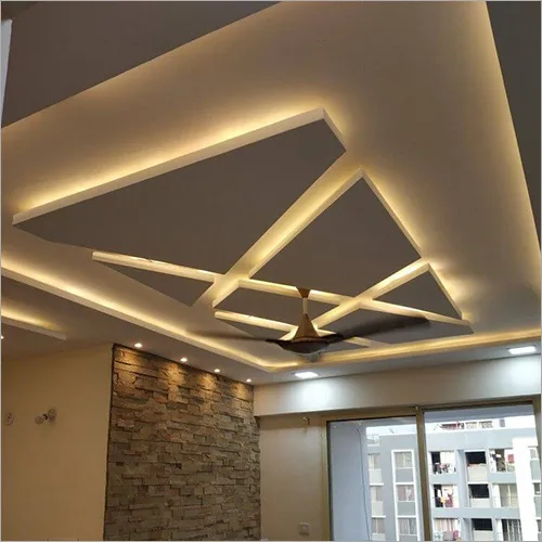 Layered false ceiling with spotlights over the kitchen