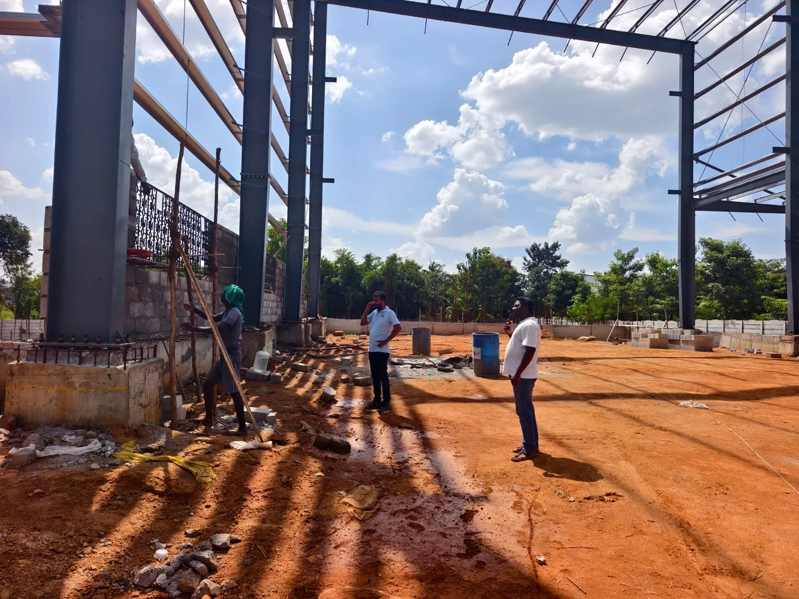 Open construction site within the structural steel frame